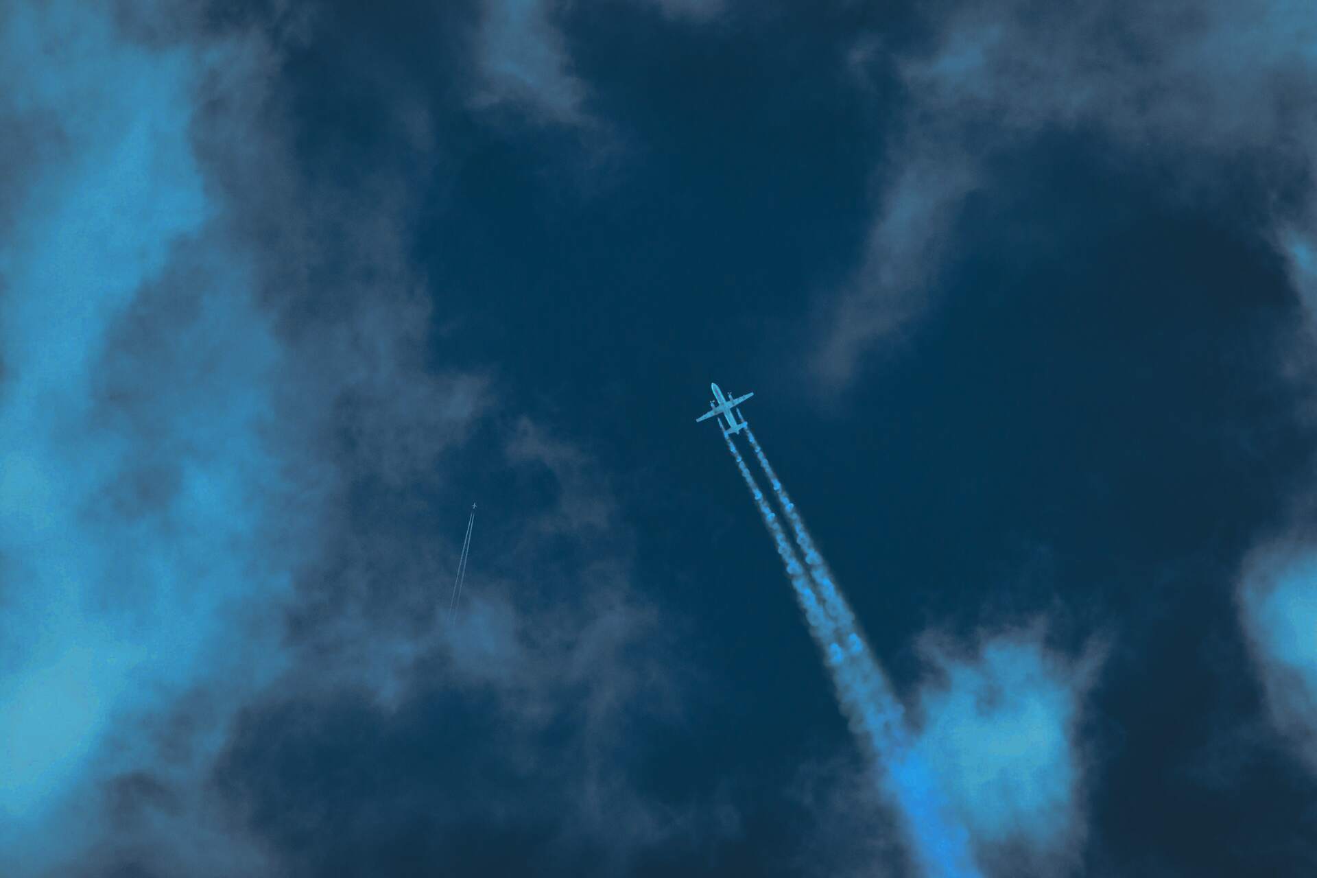 Aircraft contrail across the sky
