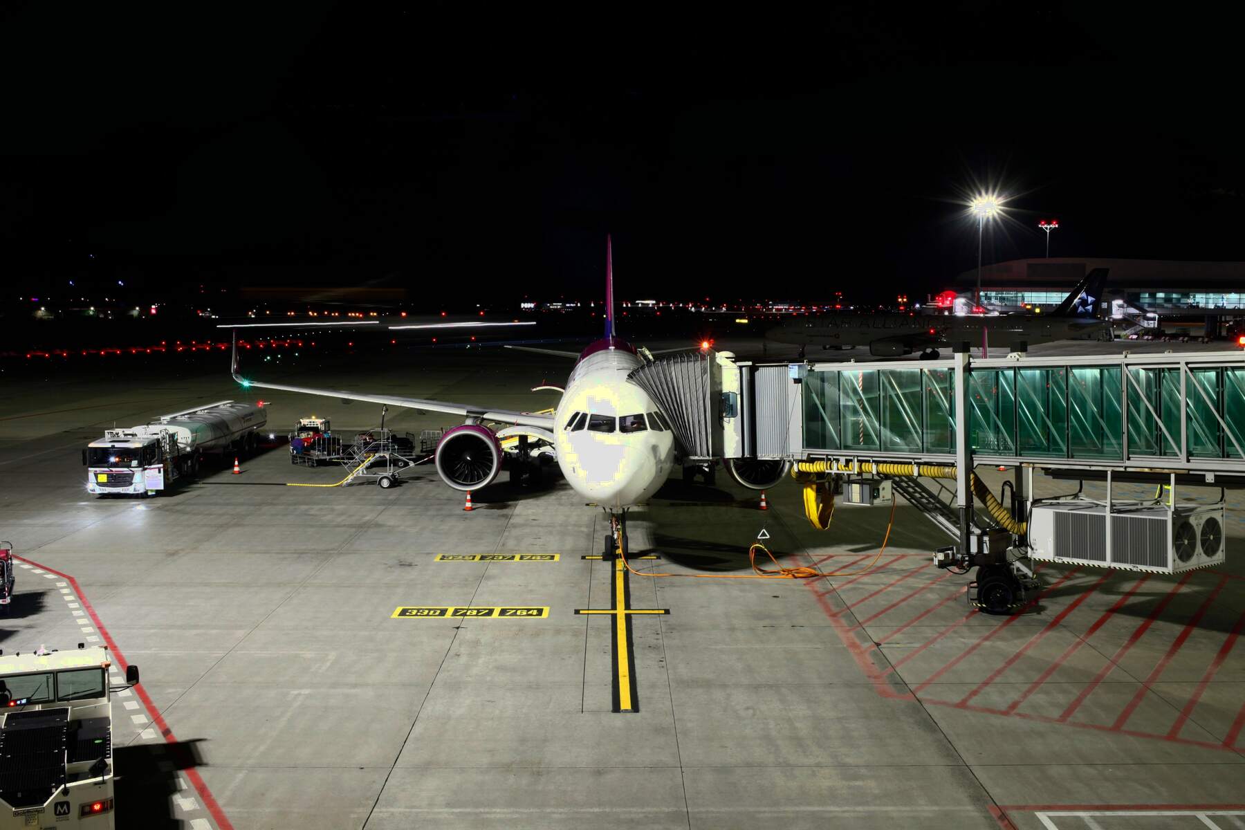 Aircraft at the gate at night